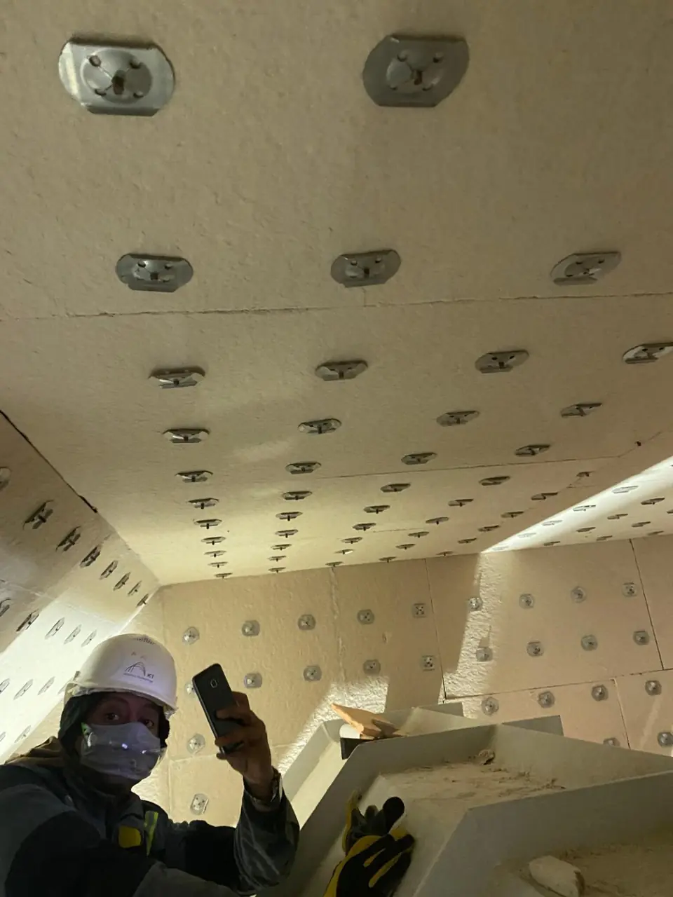 Recording conditions inside lined equipment with fixings across the roof